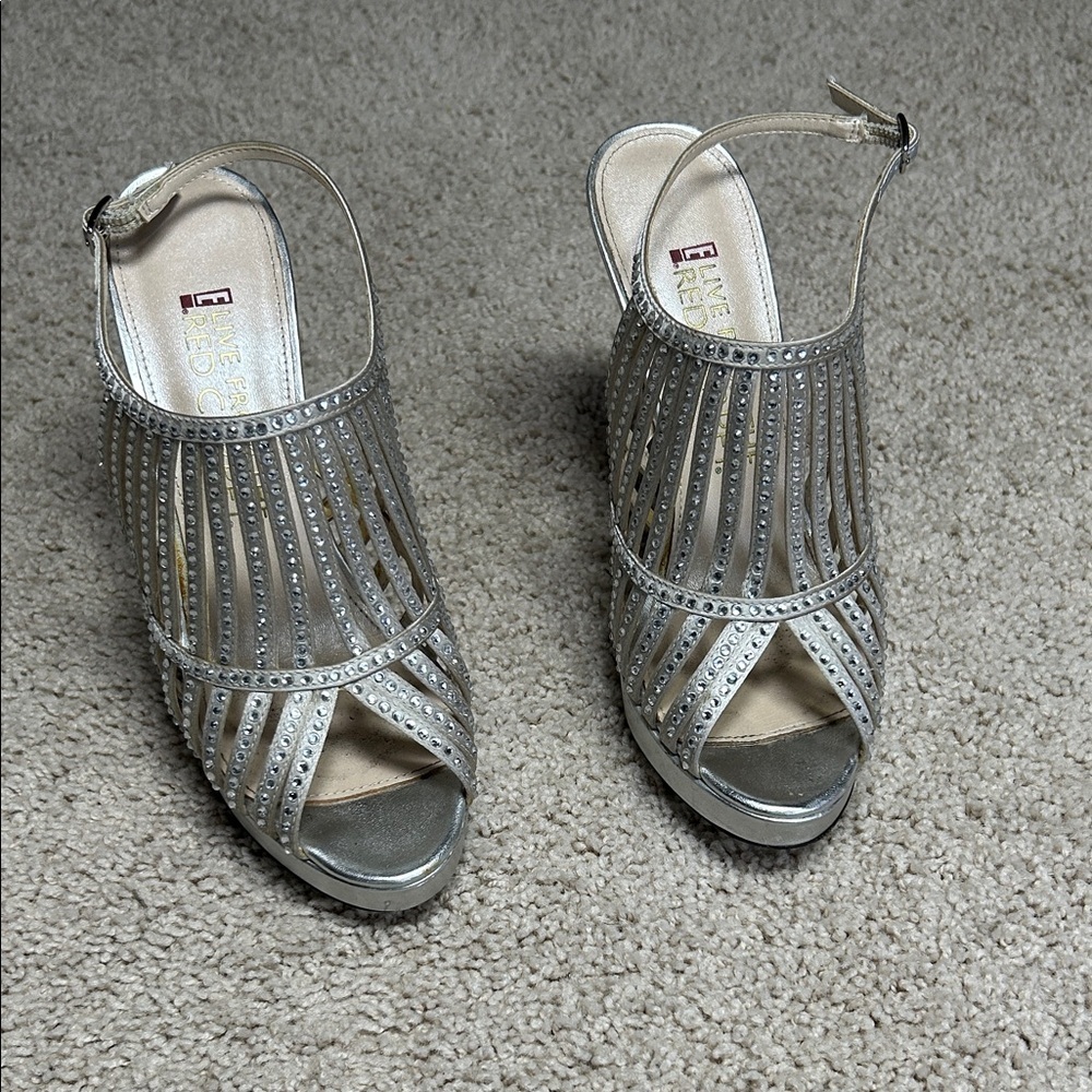 Live from the red carpet, silver, and rhinestone heels